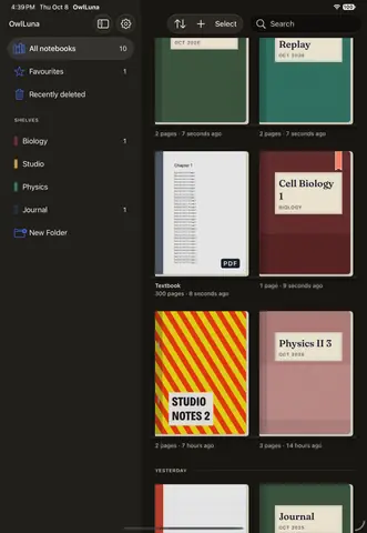 The library at night: the sidebar with its shelves, and a grid of notebook covers in cloth and print.